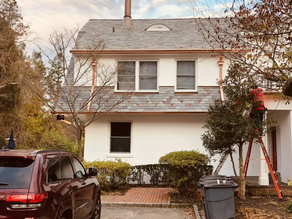 Slide of Spotless Gutter Cleaning & Repair