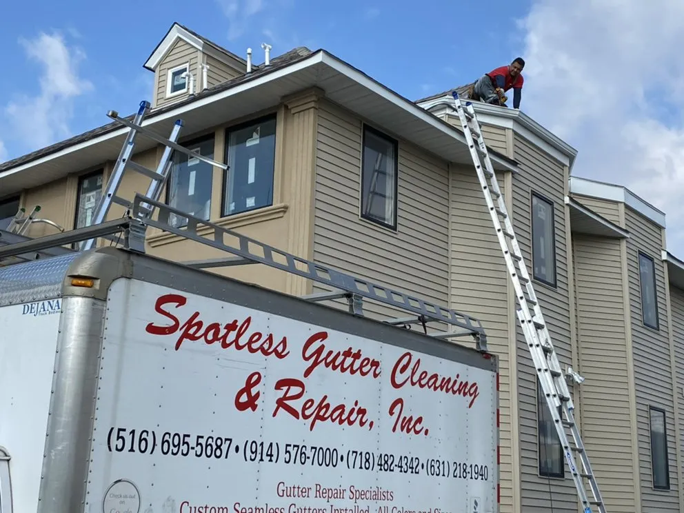 Slide of Spotless Gutter Cleaning & Repair