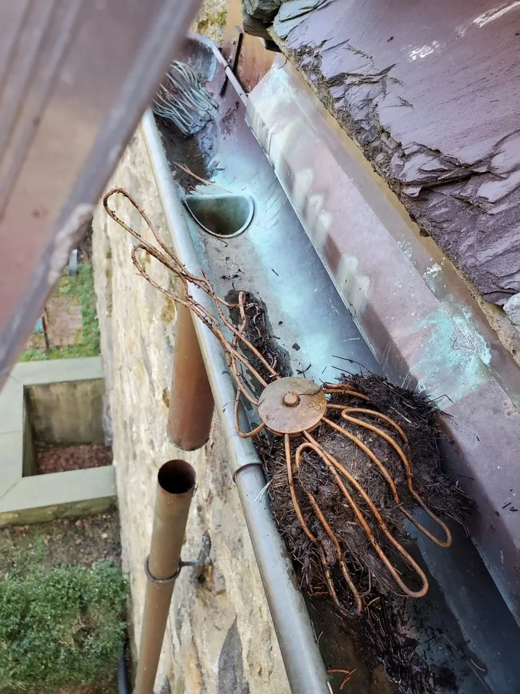 Slide of Spotless Gutter Cleaning & Repair