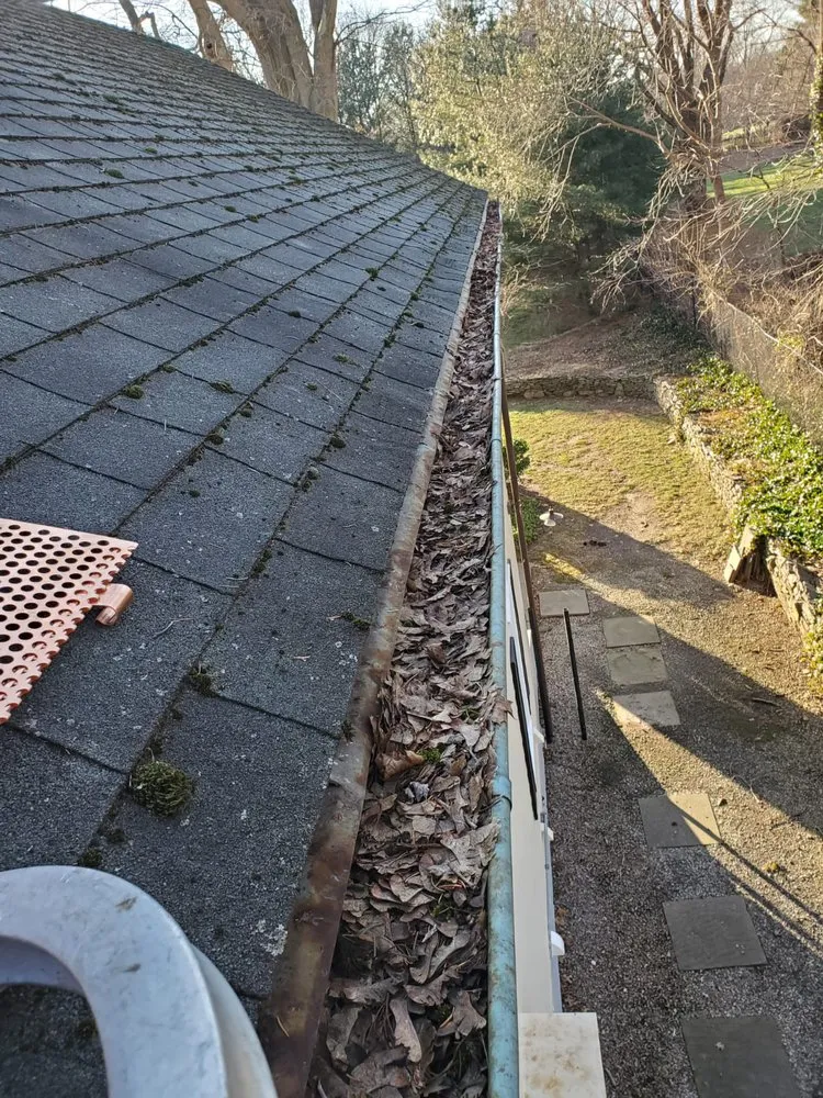 Slide of Spotless Gutter Cleaning & Repair