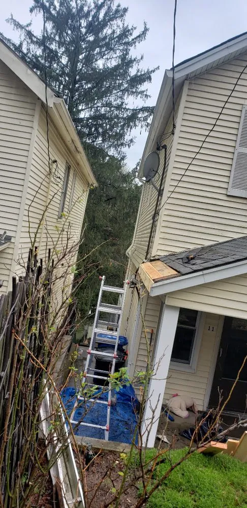 Slide of Spotless Gutter Cleaning Repair & Roof Leaks