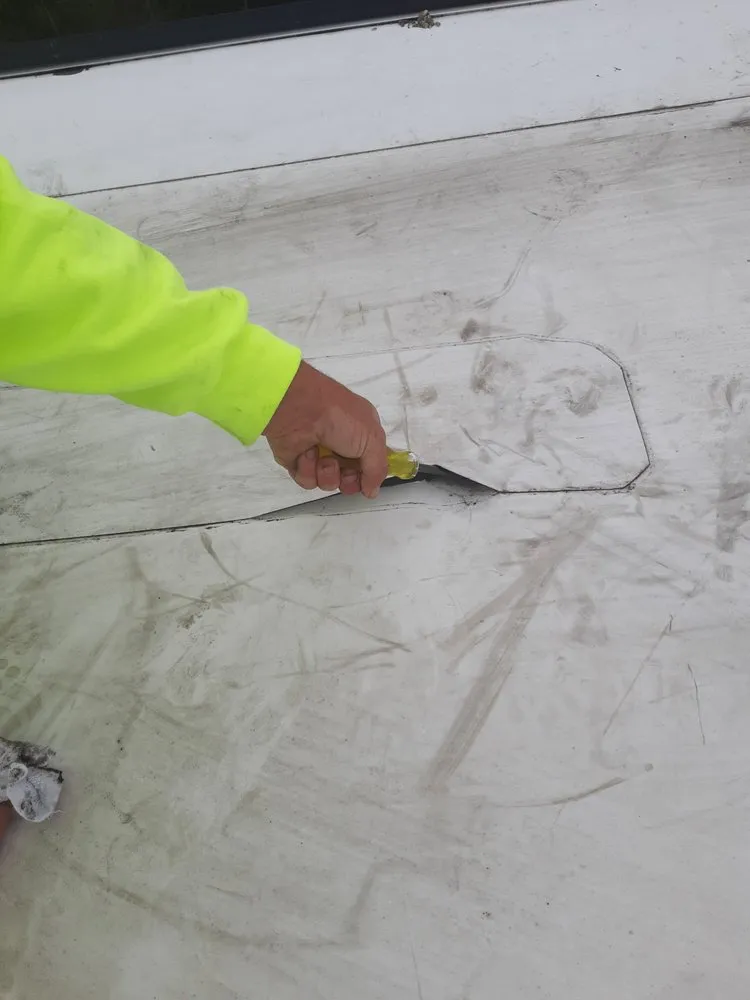 Slide of SQI Commercial Roofing