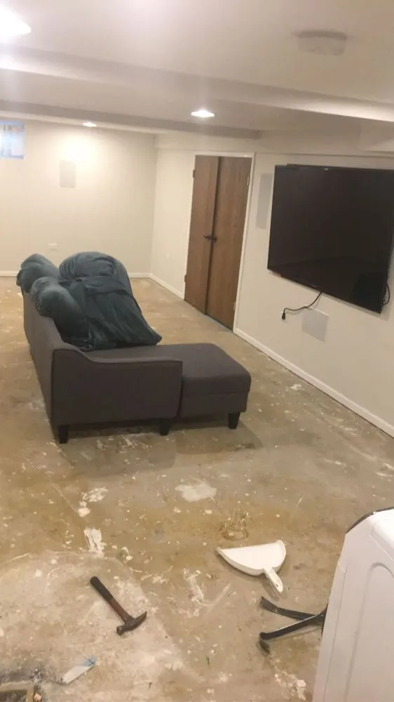 Slide of Squeegees Roofing & Construction