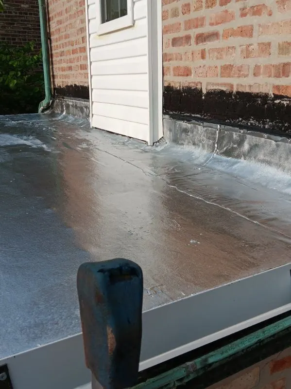 Slide of Squeegees Roofing & Construction