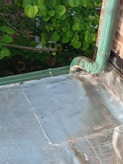 Slide of Squeegees Roofing & Construction