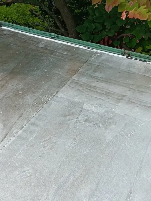 Slide of Squeegees Roofing & Construction