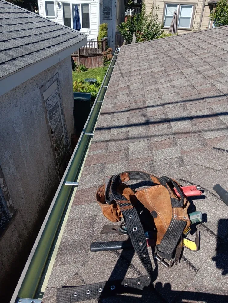 Slide of Squeegees Roofing & Construction