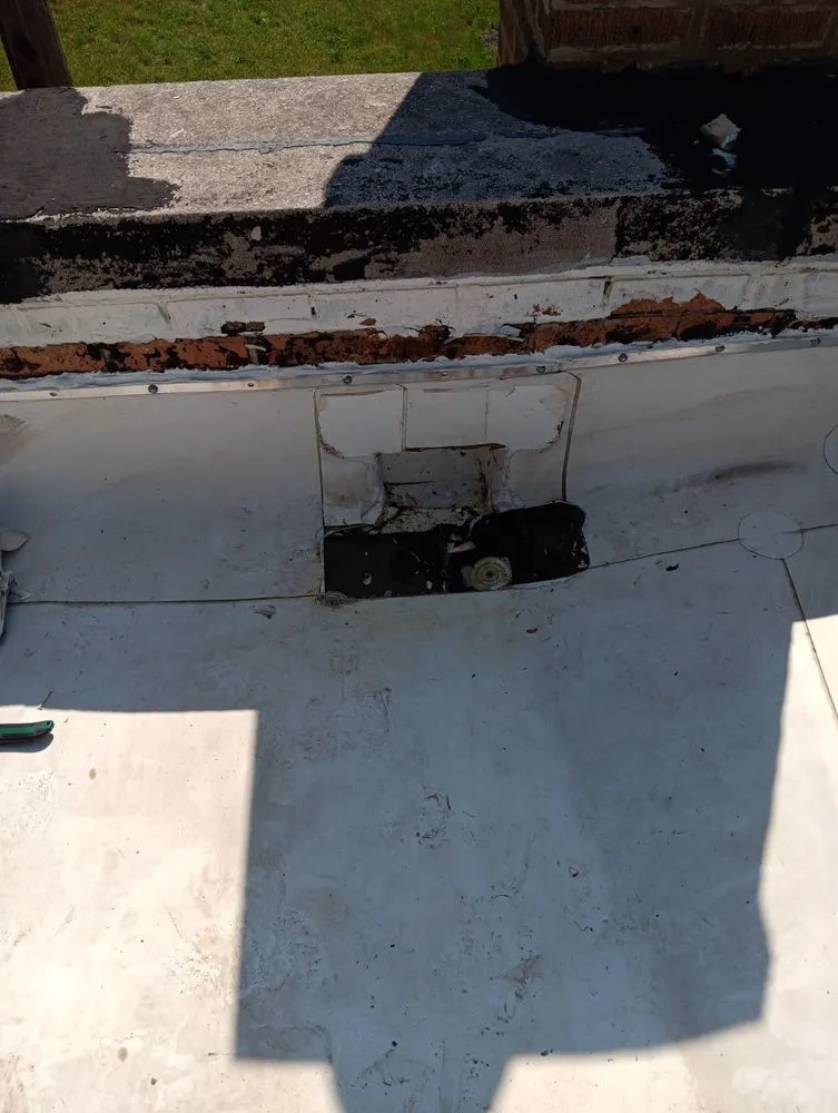 Slide of Squeegees Roofing & Construction