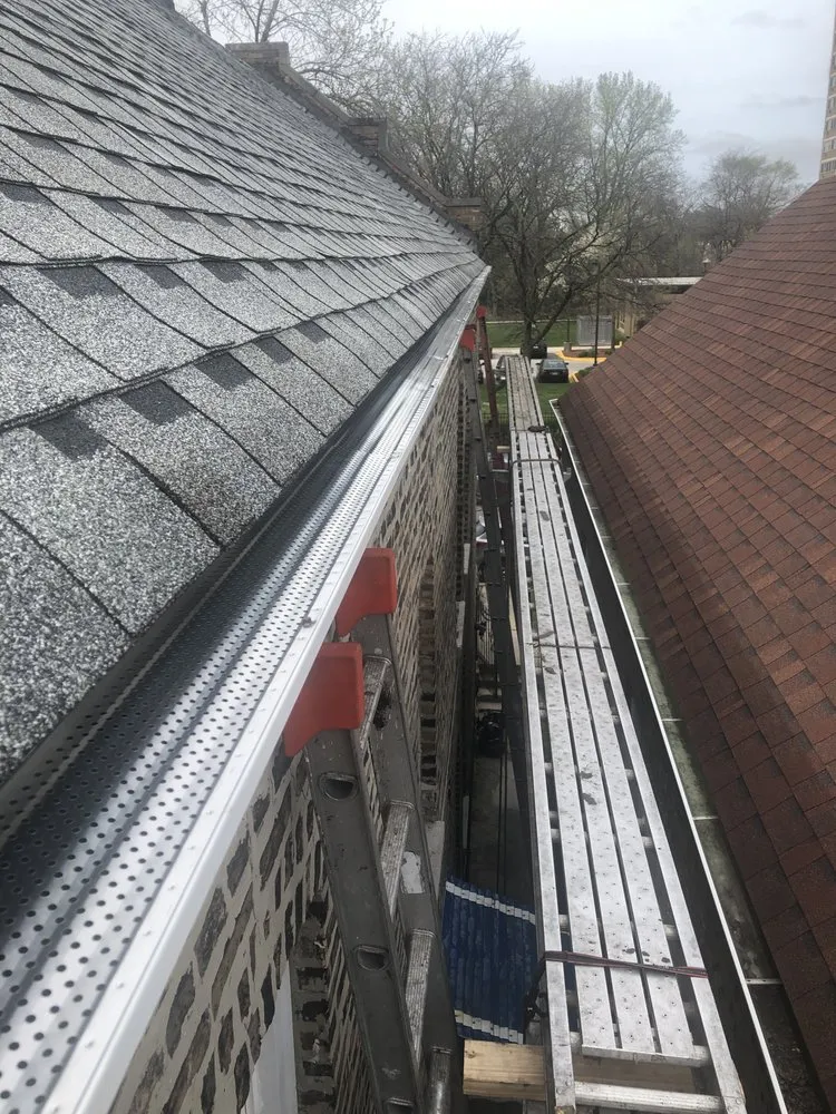Slide of SR Roofing Construction