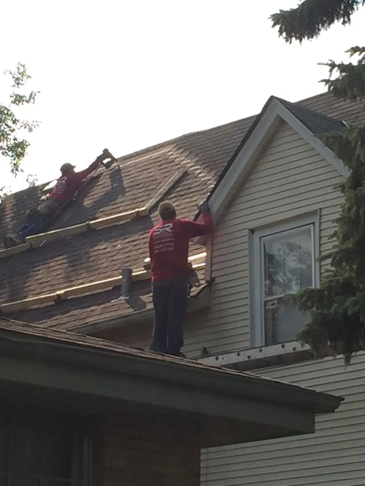 Slide of SR Roofing Construction