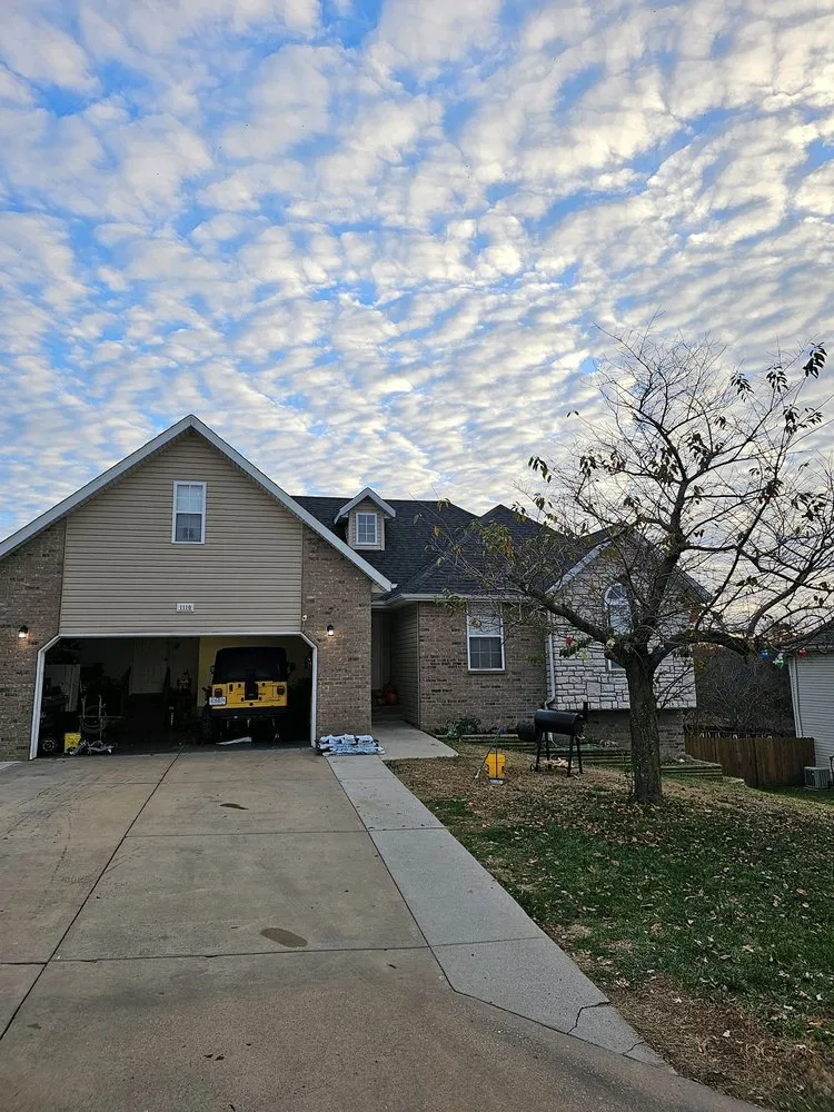 Licensed metal roofing installation experts serving Merriam, MO - SRA Roofing & Gutters