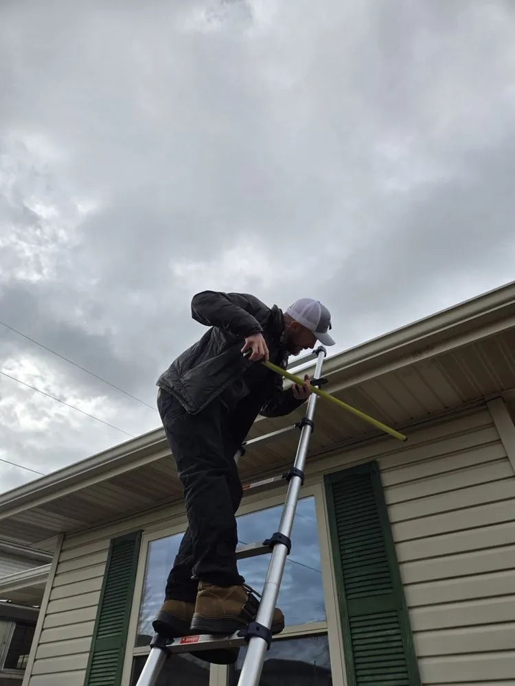 Slide of SRA Roofing & Gutters