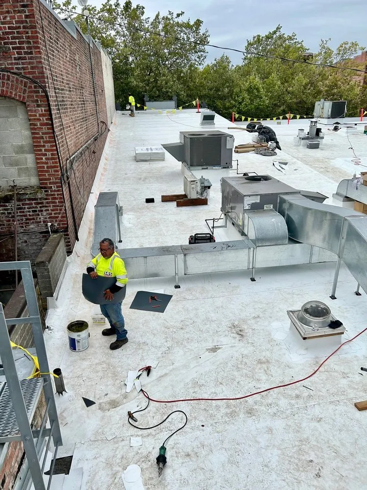 Slide of SRS Roofing