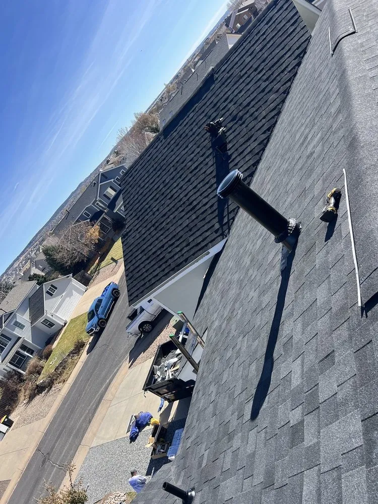 Slide of Srs Roofing