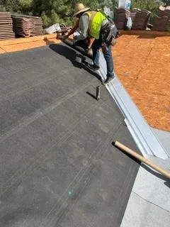 Slide of SRS Roofing