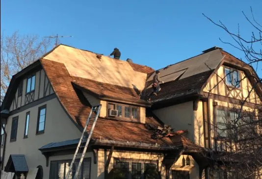 Slide of SRT Roofing Services