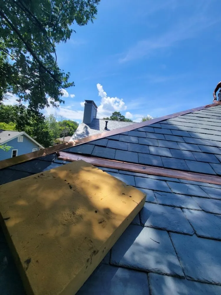 Slide of S.S Roofing