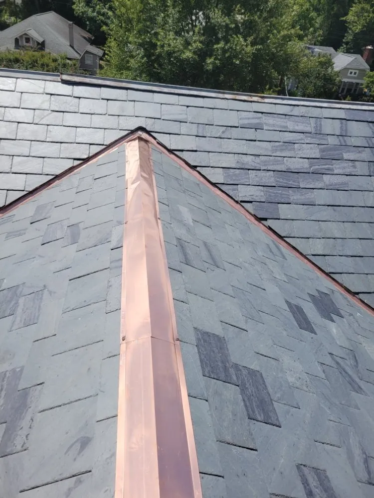 Slide of S.S Roofing