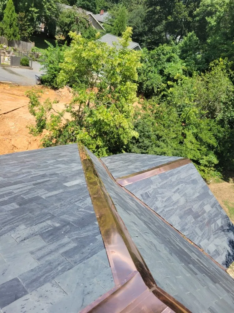 Slide of S.S Roofing