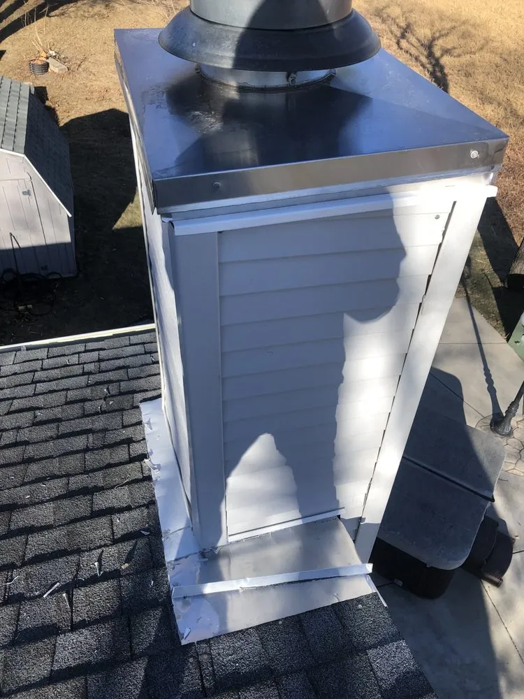 Slide of Stacked Chimneys Roofing & Exteriors