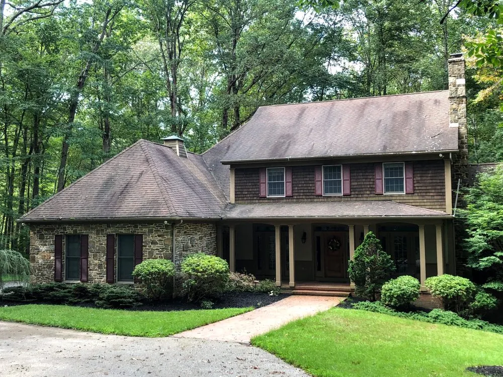 Slide of Stain Medix Roof Cleaning
