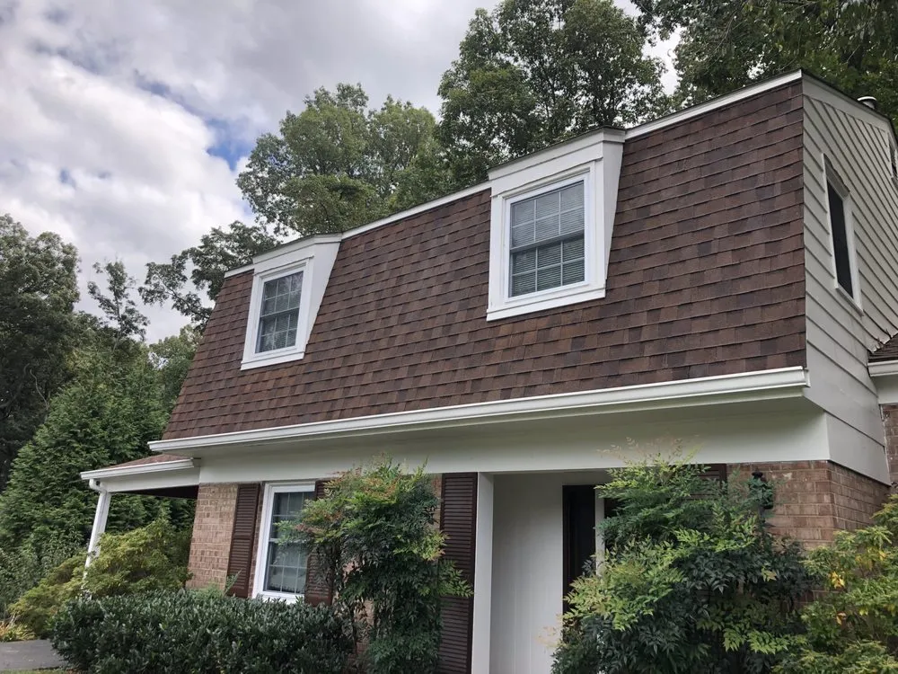 Slide of Stain Medix Roof Cleaning