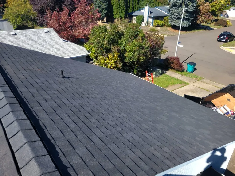 Slide of Stallion Roofing