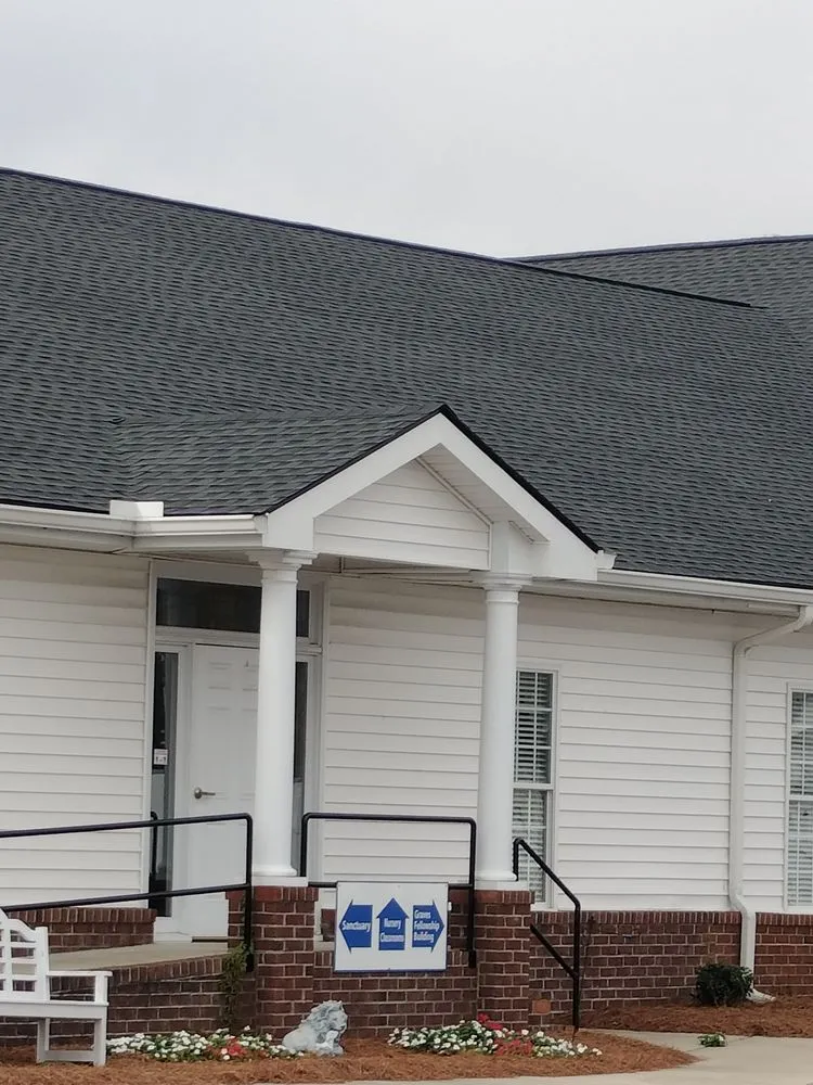 Slide of STAMPER Roofing