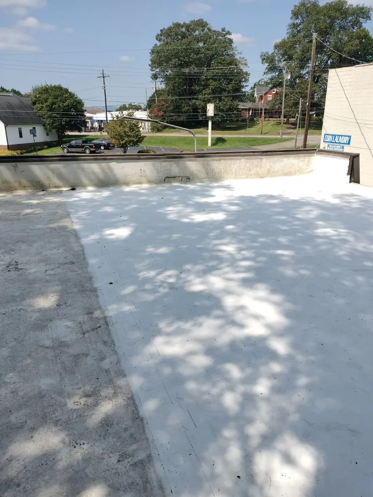 Slide of STAMPER Roofing