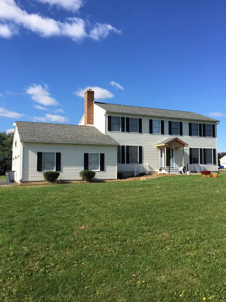 Slide of Stanley & Sons Roofing