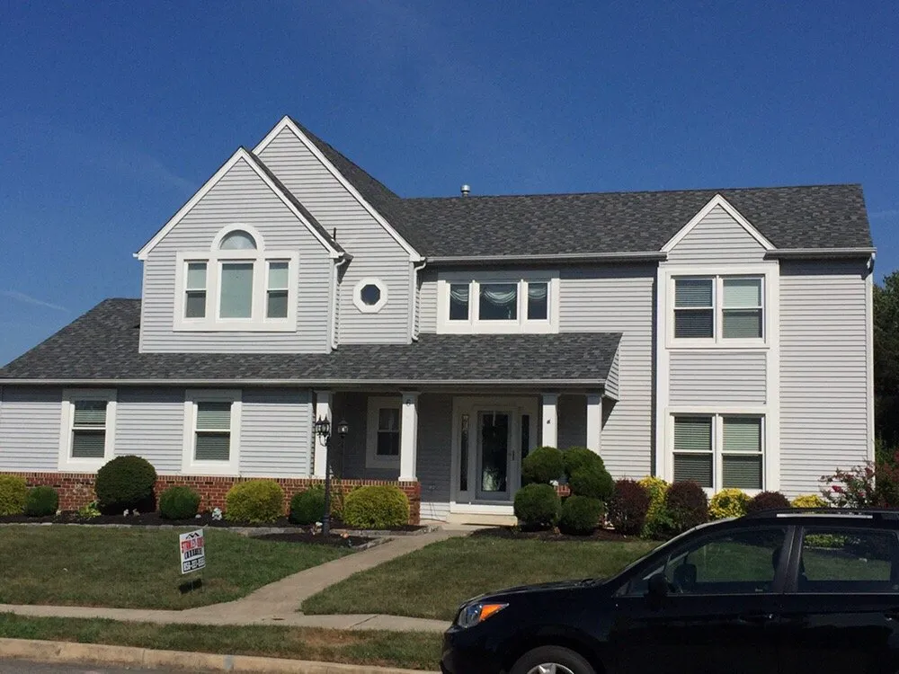 Slide of Stanley & Sons Roofing