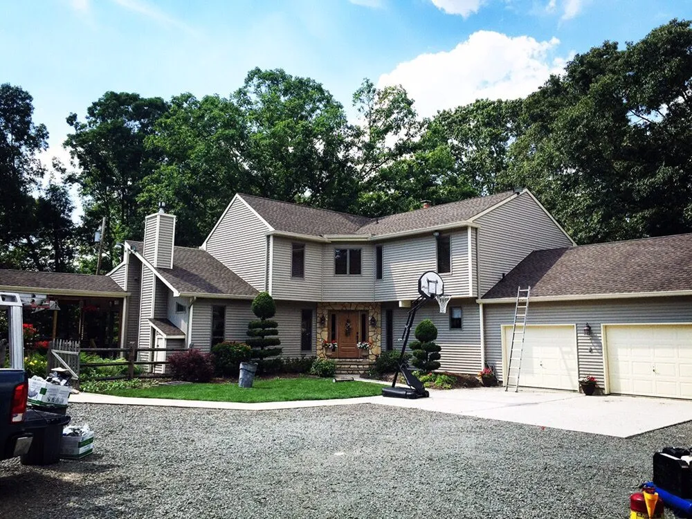 Slide of Stanley & Sons Roofing