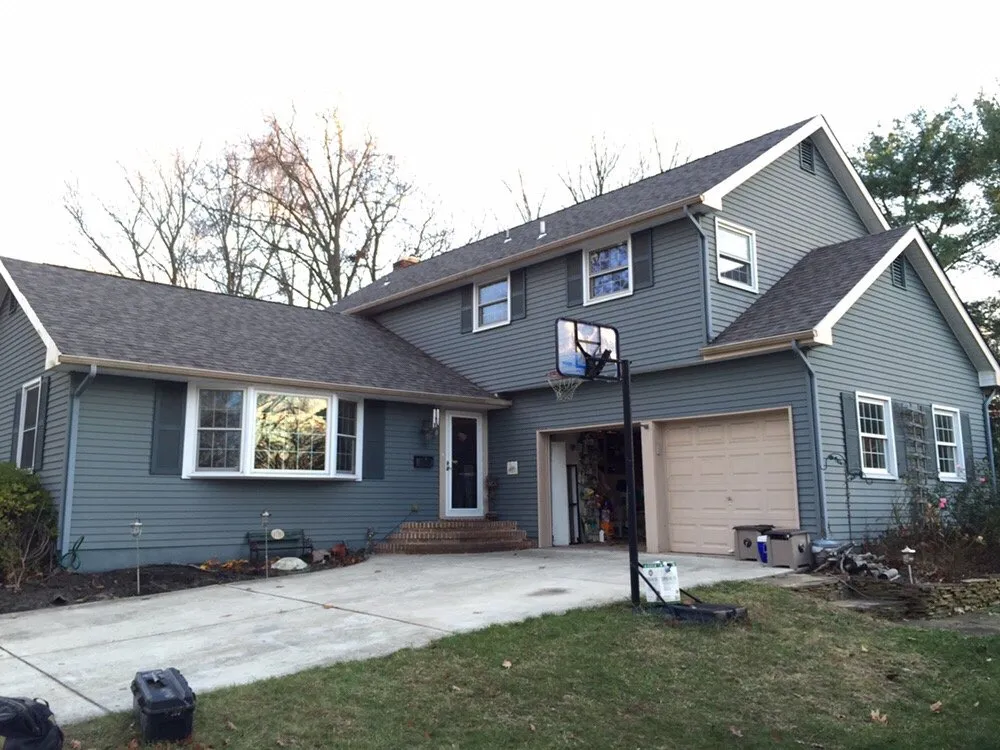 Slide of Stanley & Sons Roofing