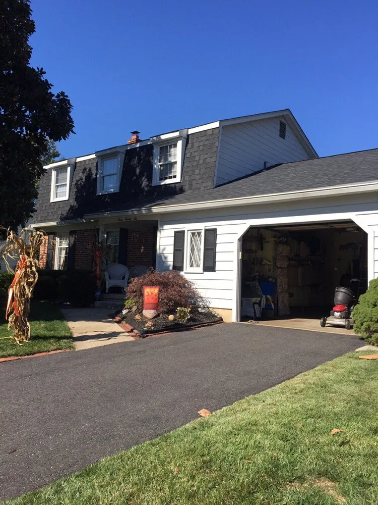 Slide of Stanley & Sons Roofing