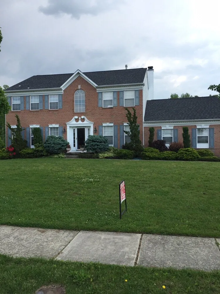 Slide of Stanley & Sons Roofing