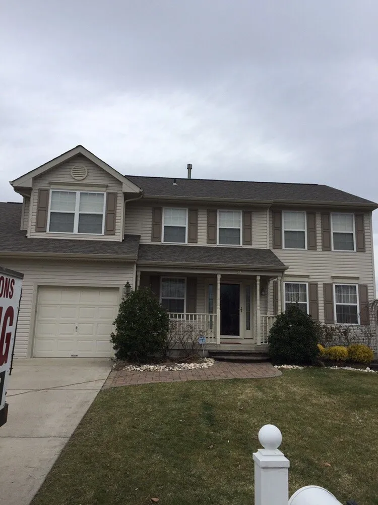 Slide of Stanley & Sons Roofing