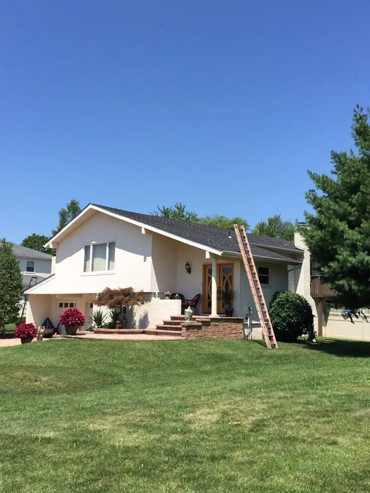 Slide of Stanley & Sons Roofing