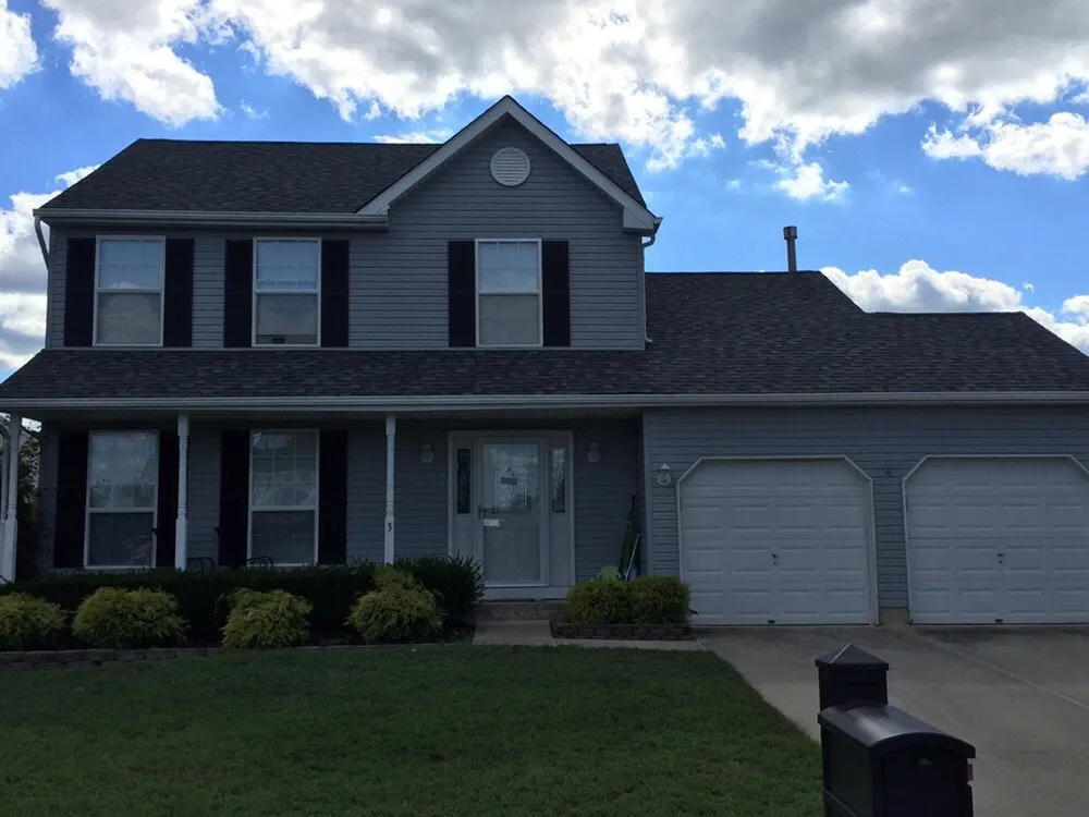 Slide of Stanley & Sons Roofing