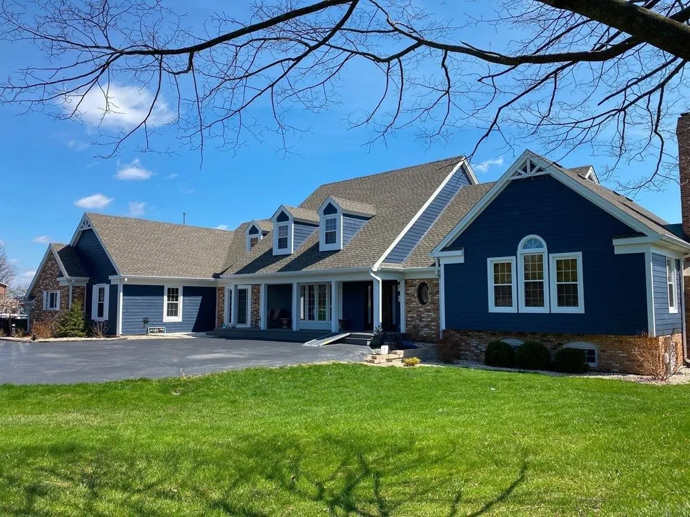 Slide of Stan’s Roofing & Siding