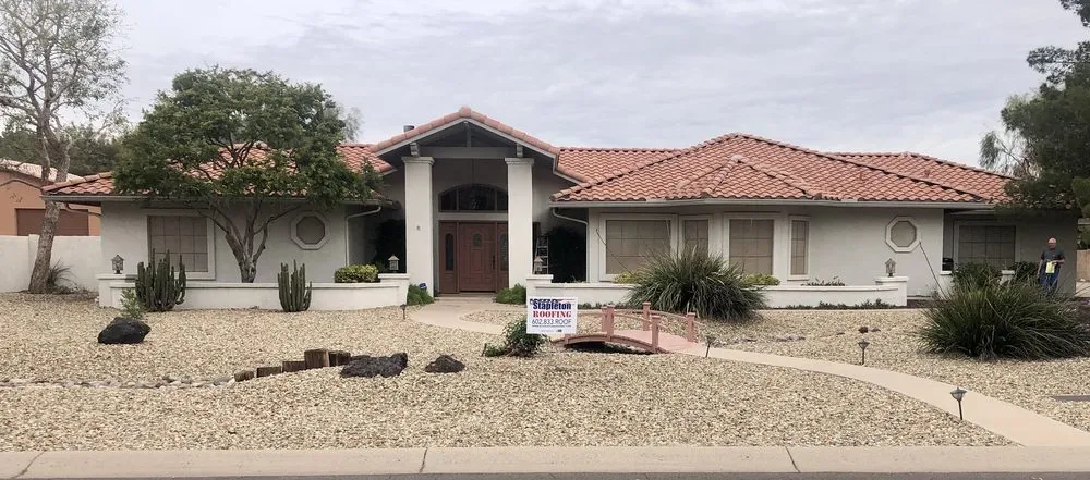 Slide of Stapleton Roofing