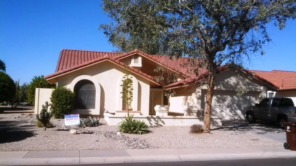 Slide of Stapleton Roofing
