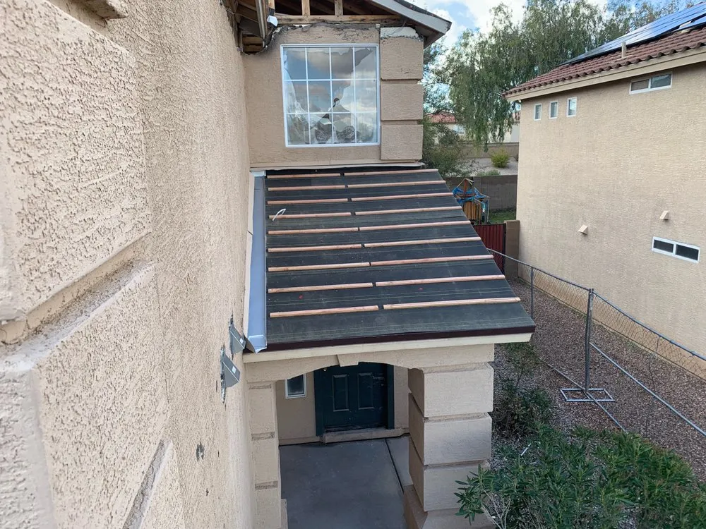 Slide of State 48 Roofing