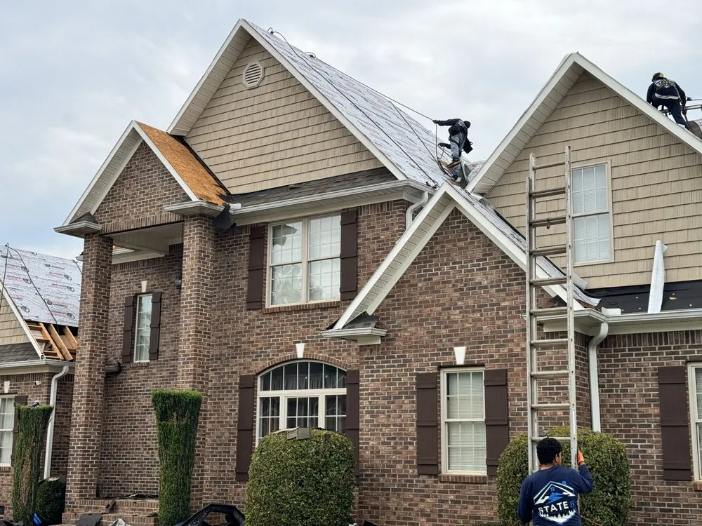 Slide of State Eight Roofing