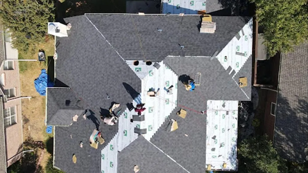 Slide of Status Roofing