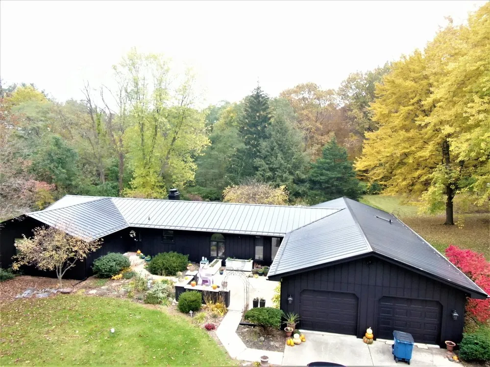 Slide of Steel Master Roofing