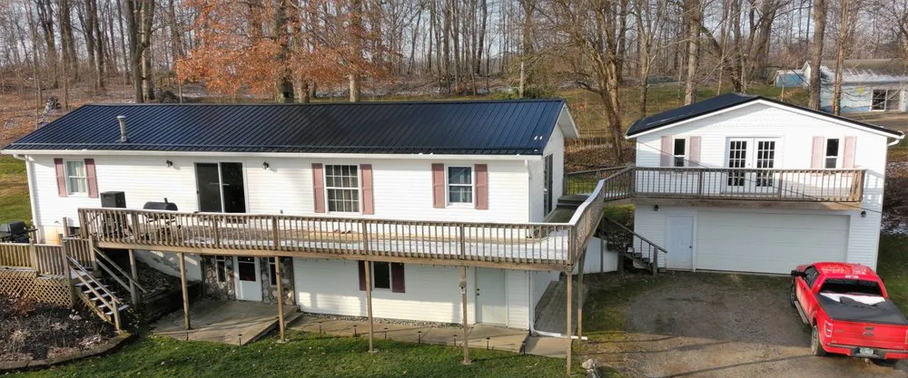 Slide of Steel Master Roofing