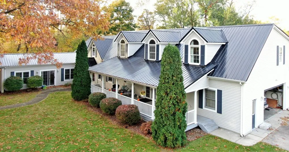 Slide of Steel Master Roofing