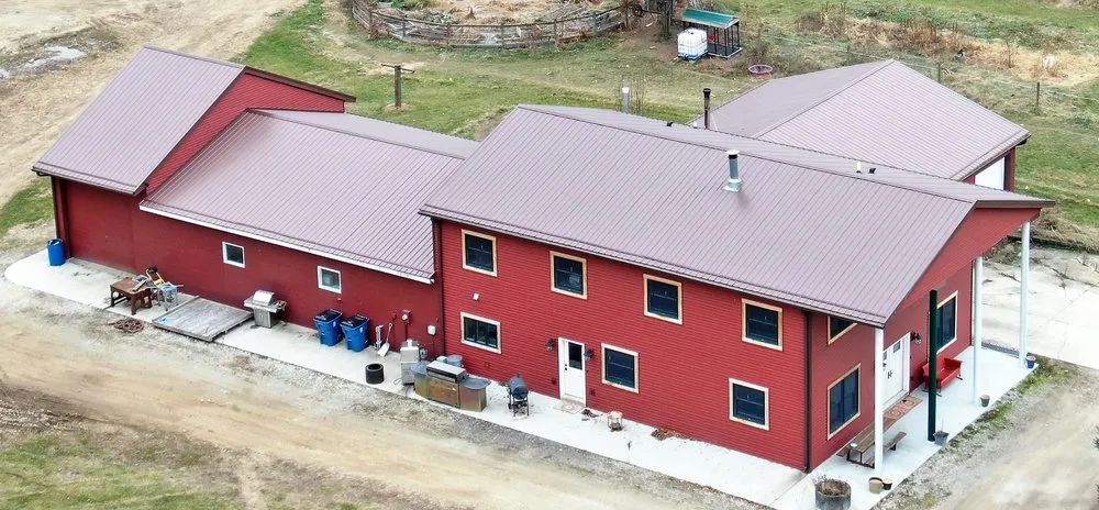 Slide of Steel Master Roofing