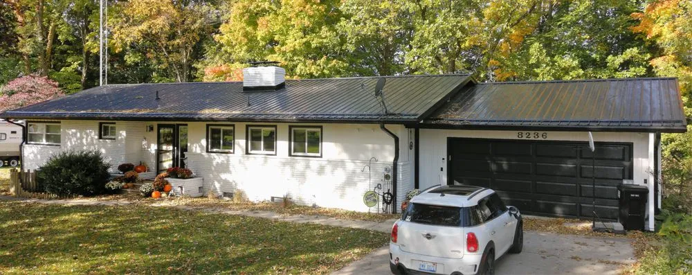 Slide of Steel Master Roofing