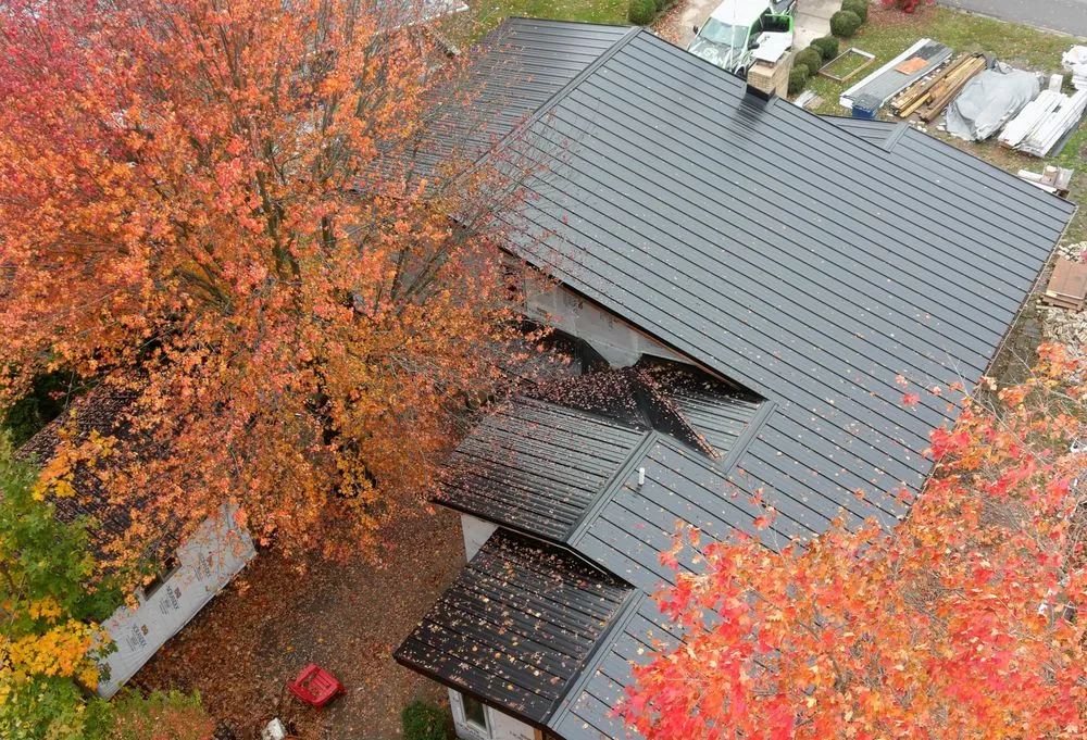 Slide of Steel Master Roofing